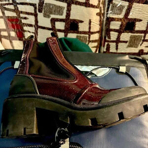 Tory Burch booties in burgundy. Worn once. Size 8.